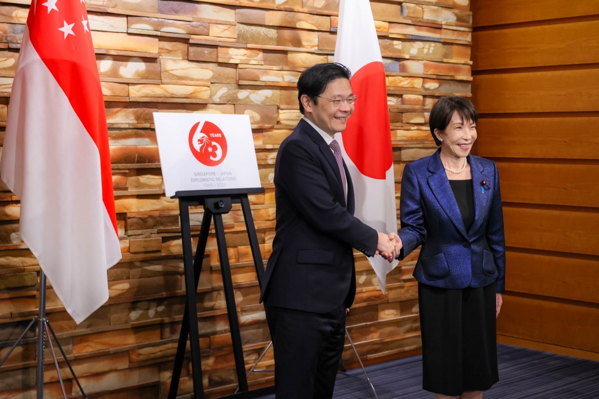 Thủ tướng Singapore Lawrence Wong (trái) và người đồng cấp Nhật Bản Sanae Takaichi tối 18/3. Ảnh: X/@takaichi_sanae