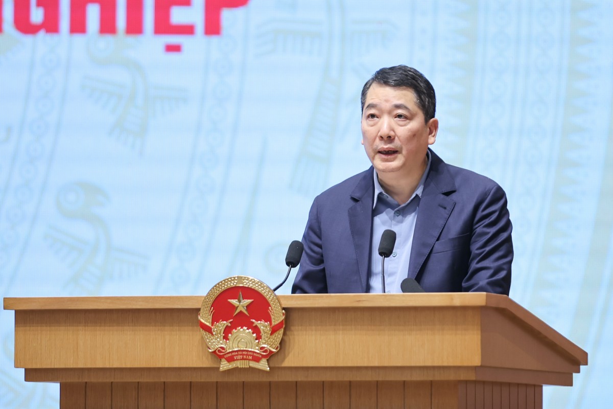 Thứ trưởng Bộ Tài chính Cao Anh Tuấn phát biểu tại Hội nghị - Ảnh VPG