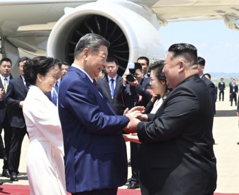 Ông Kim Jong Un ra sân bay đón ông Tập Cận Bình