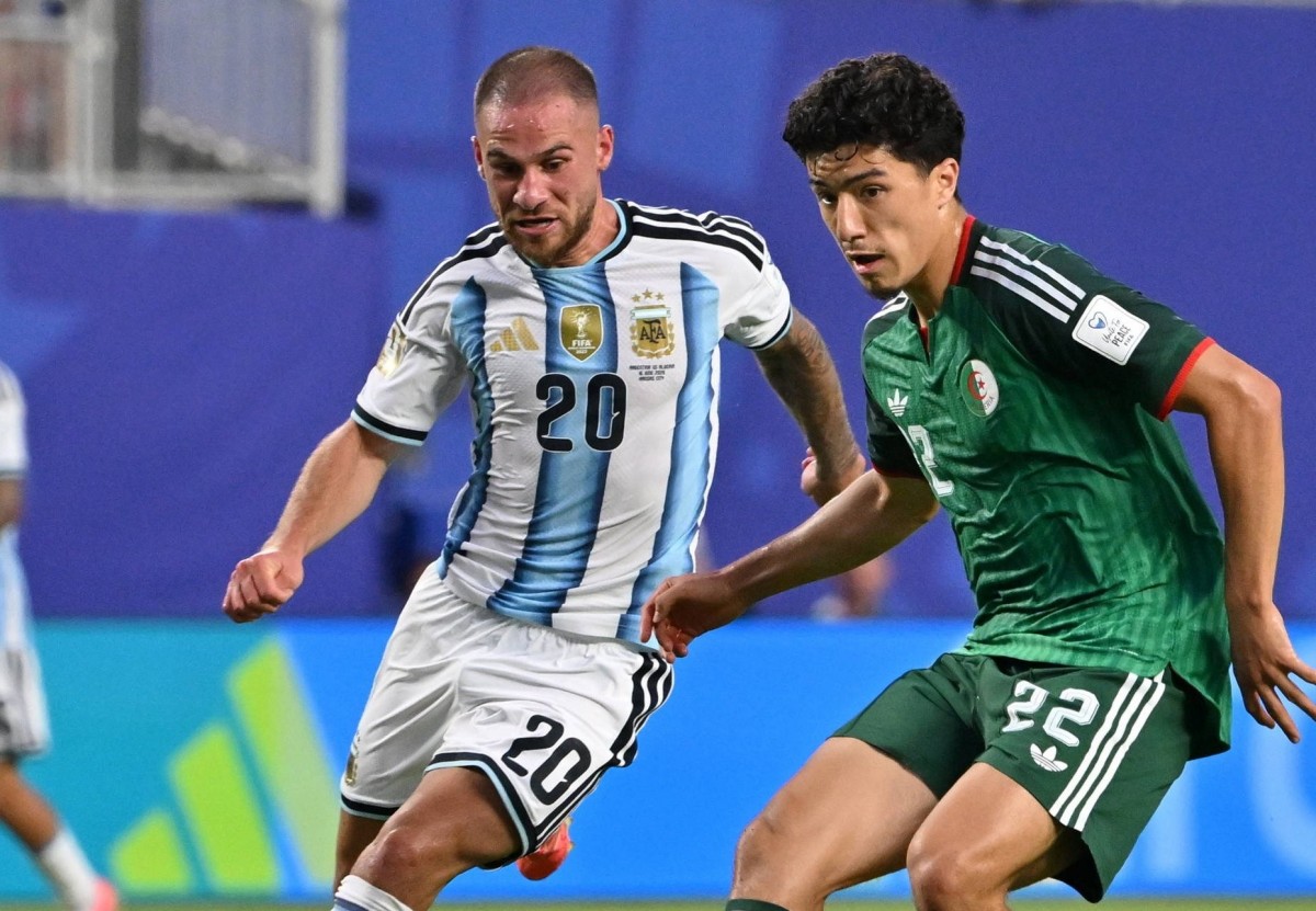 Ibrahim Maza (phải) trong trận gặp Argentina. Ảnh: X/@bayer04_en (tài khoản X của CLB Bayer Leverkusen)