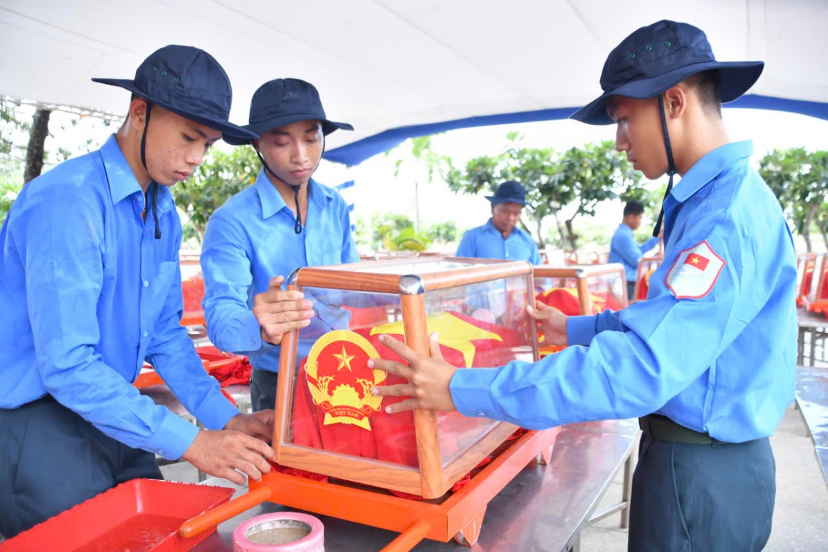 Chuẩn bị nghi thức an táng các hài cốt liệt sĩ tại Nghĩa trang Dốc Bà Đắc - Ảnh: VGP/QK9