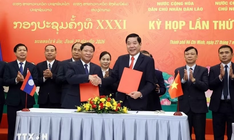 Đẩy nhanh công tác tìm kiếm, quy tập hài cốt liệt sĩ Việt Nam tại Lào