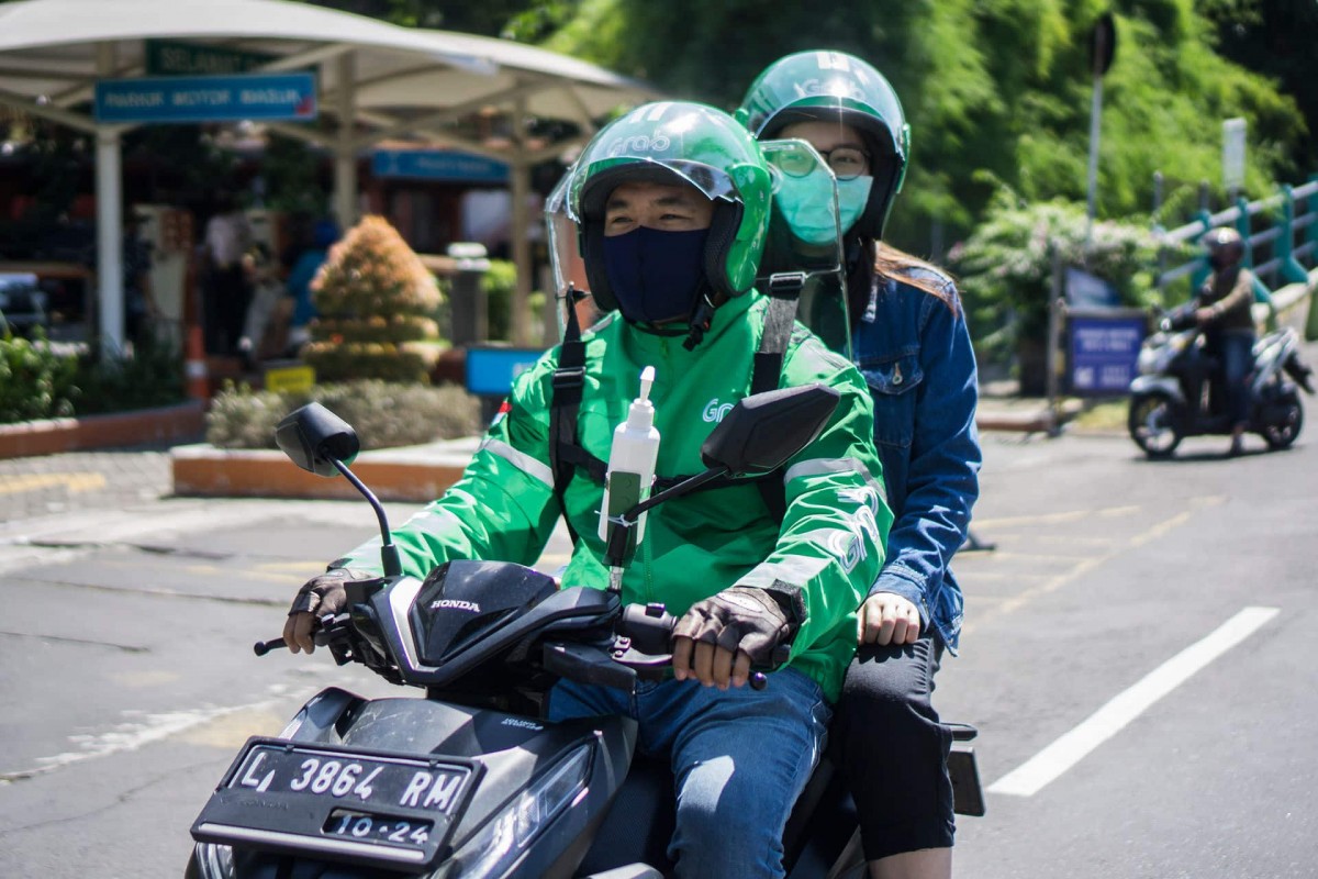 Grab Indonesia giữ tối đa 8% phần doanh thu thuộc diện tính hoa hồng, tài xế vì thế được giữ lại ít nhất 92%. Ảnh: Grab Indonesia