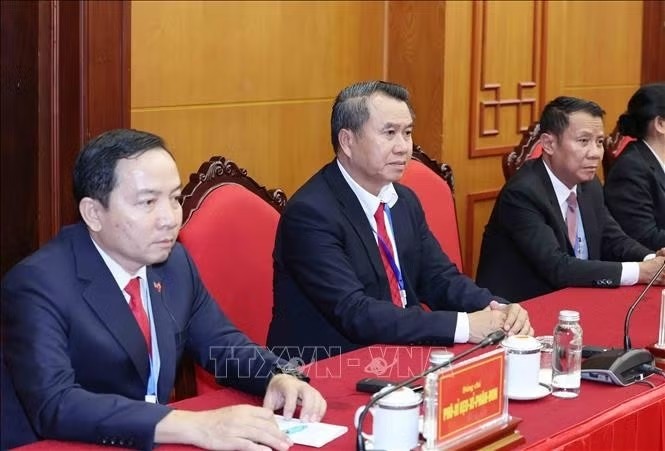 Các đồng chí cán bộ cấp Thứ trưởng và tương đương của Đảng Nhân dân Cách mạng Lào tham dự buổi tiếp - Ảnh: TTXVN