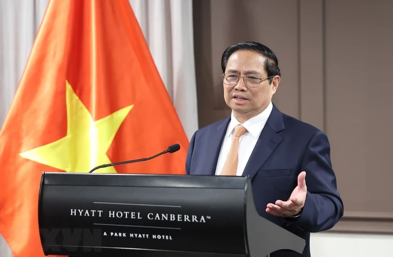 Thủ tướng Phạm Minh Ch&iacute;nh ph&aacute;t biểu tại buổi gặp cộng đồng người Việt Nam tại Australia. Ảnh: TTXVN
