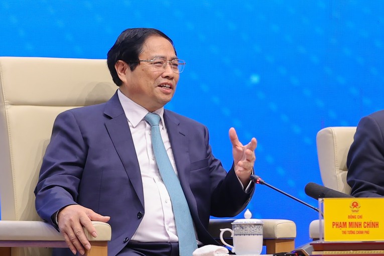Thủ tướng Ch&iacute;nh phủ Phạm Minh Ch&iacute;nh chia sẻ tại hội nghị. Ảnh: VGP.