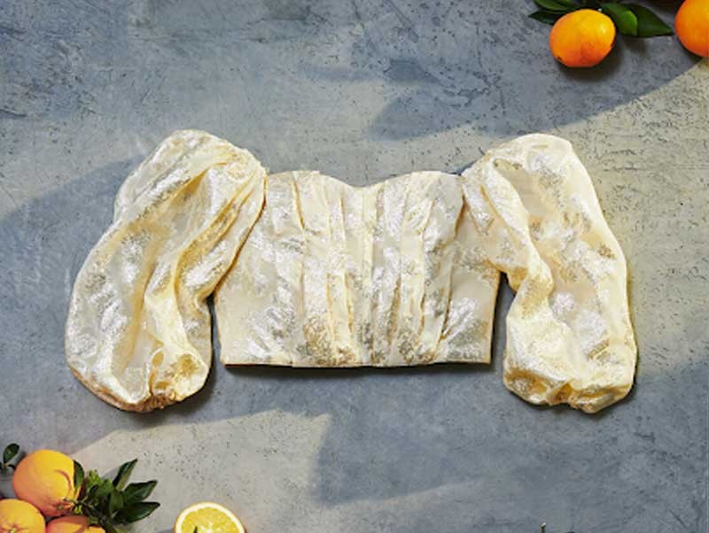 Sản phẩm &aacute;o của h&atilde;ng thời trang H&amp;amp;amp;amp;M từ sợi cam. Ảnh: Orange Fiber