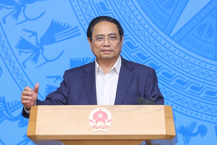 Thủ tướng Phạm Minh Ch&iacute;nh kết luận, đ&atilde; đủ điều kiện chuyển Covid-19 từ bệnh truyền nhiễm nh&oacute;m A sang nh&oacute;m B. Ảnh: VGP