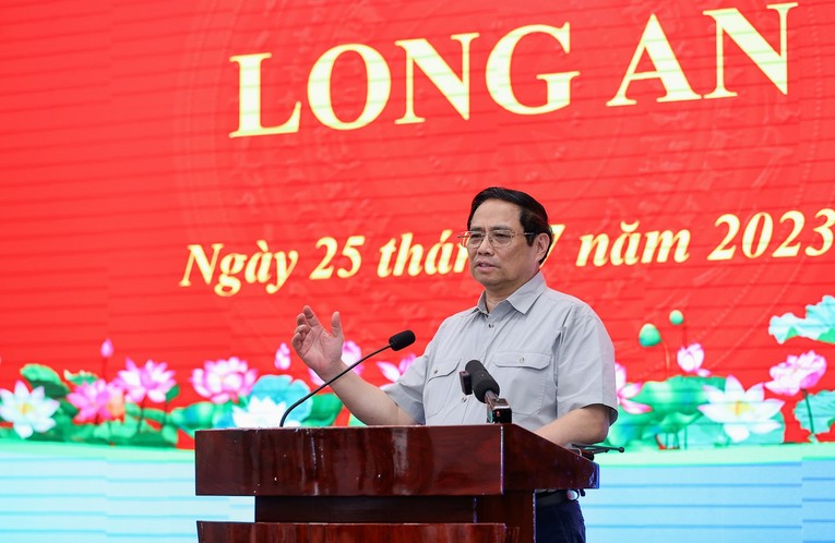 Thủ tướng Phạm Minh Ch&iacute;nh ph&aacute;t biểu tại cuộc l&agrave;m việc. Ảnh: VGP