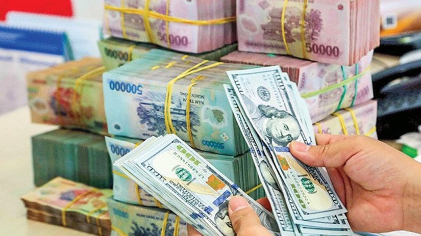 VNDirect: &Aacute;p lực l&ecirc;n tỷ gi&aacute; tăng, VND c&oacute; thể mất gi&aacute; 4% so với USD năm nay